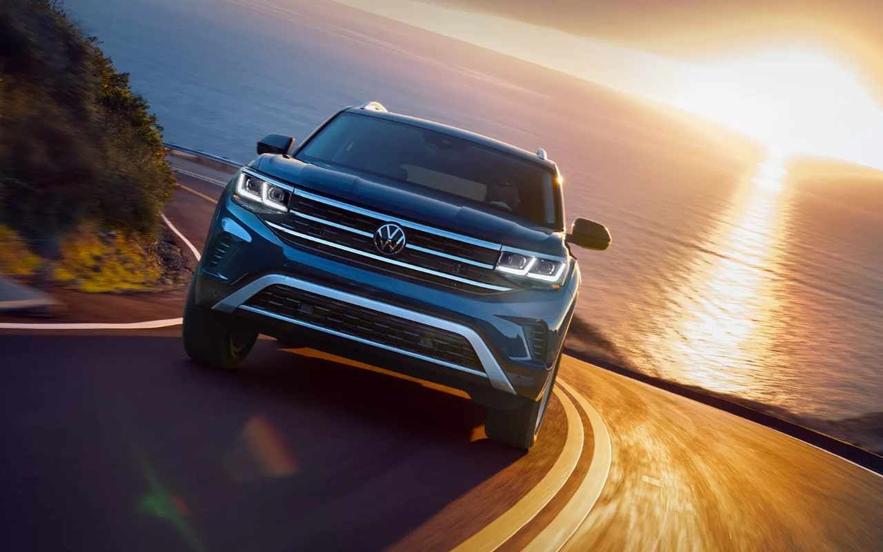 front and inclined view of a 2023 VW Atlas at sunset