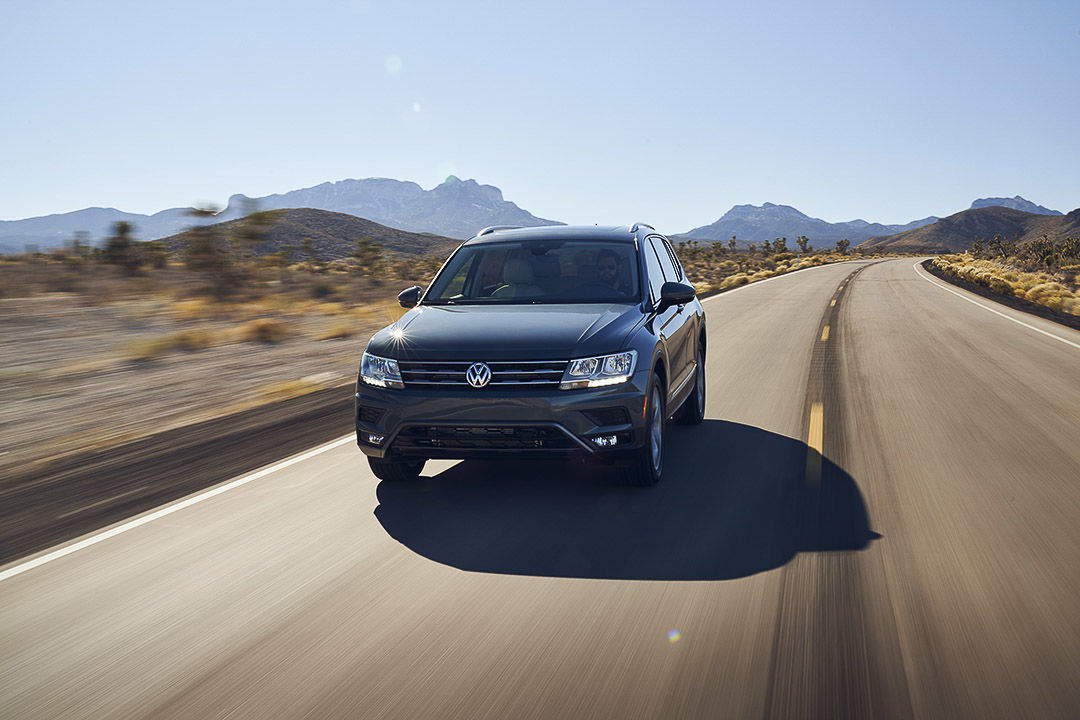 front view of the 2021 Volkswagen Tiguan driven on a road
