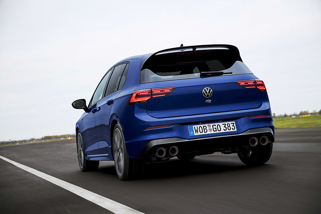 Back of a blue 2022 Golf R with its 2 double exhaust tailpipes on each side at the bottom