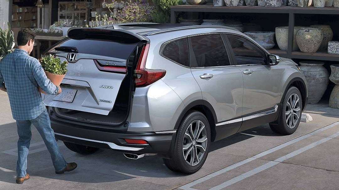 rear view of the 2021 Honda CR-V with the trunk door opening