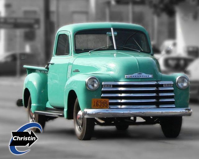 Image of an old model of chevrolet pickup truck color like turquoise. A small truck of the beginnings of chevrolet.