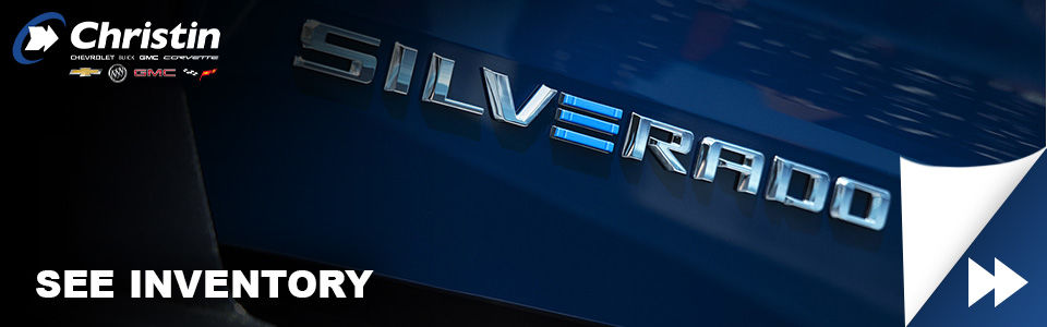 Stapled image of one side of a Chevrolet Silverado EV pickup truck door where the model of the car clearly reads: Silverado. Christin automobile logo on the upper left corner and a text on the lower left corner that says: see inventory