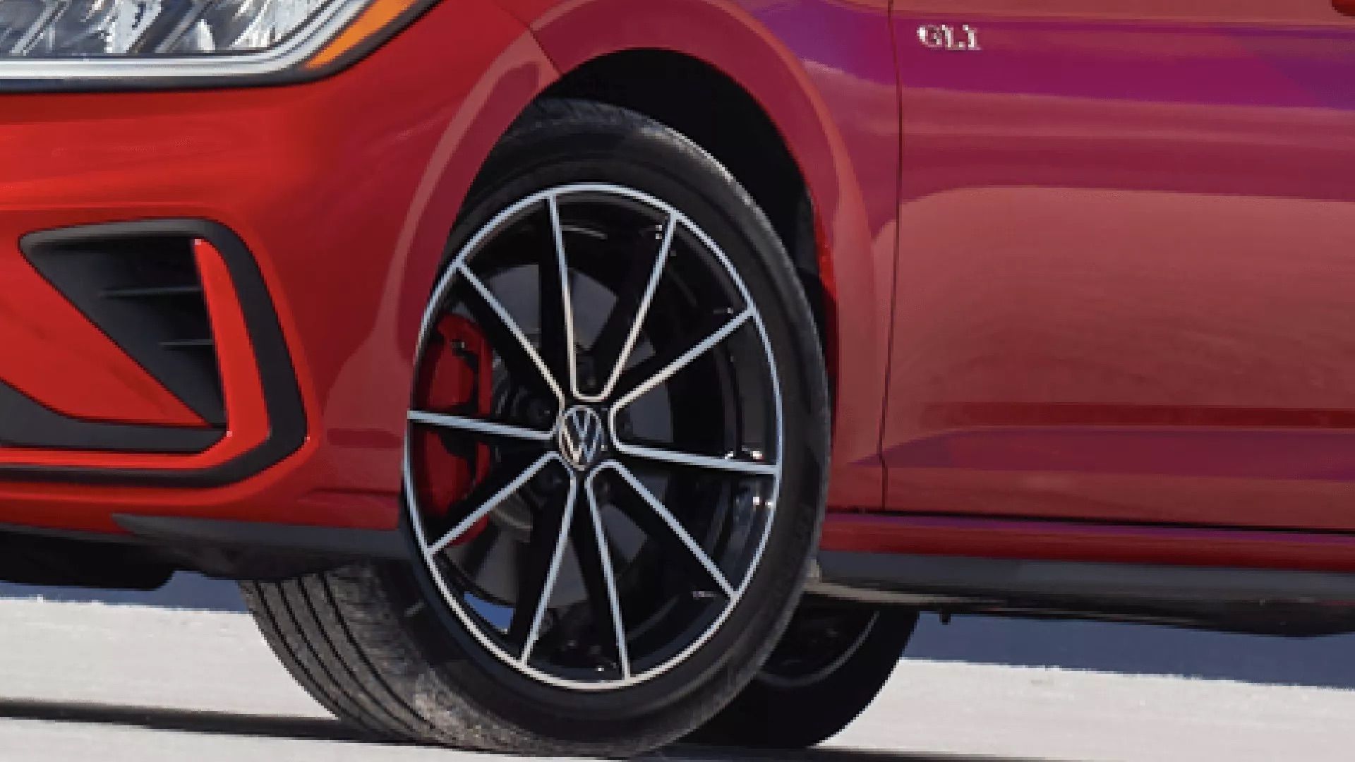 Volkswagen technician checking brake components for Edmonton driving conditions