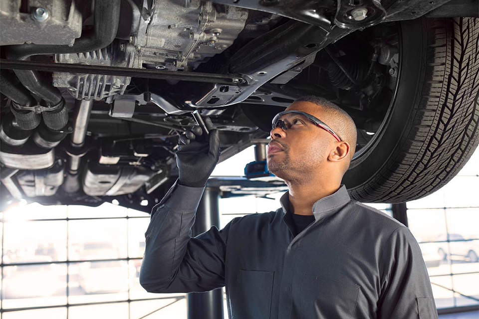  Image showing a certified mechanic inspecting the underside of a vehicle. 150-point inspection. Certified mechanic. Specialized mechanic. 150-point inspection. Christin certified mechanics. Automotive quality control. Complete vehicle verification. Christin inspection standards. Guaranteed vehicle safety. Precise mechanical diagnosis. Professional car evaluation. GM certified inspection. Reliability of automotive inspection. Christin mechanical expertise. Thorough vehicle inspection. Pre-owned quality assurance. Detailed auto check. Christin technical inspection. Rigorous car control. Certification after inspection. Transparent inspection process. Quality pre-sale inspection. High standards of Christin inspection. Complete inspection.Certified GM Vehicles at Christin.