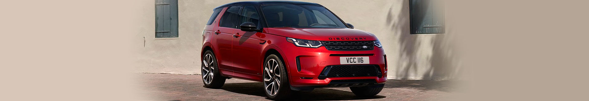 Land Rover Discovery Sport in red