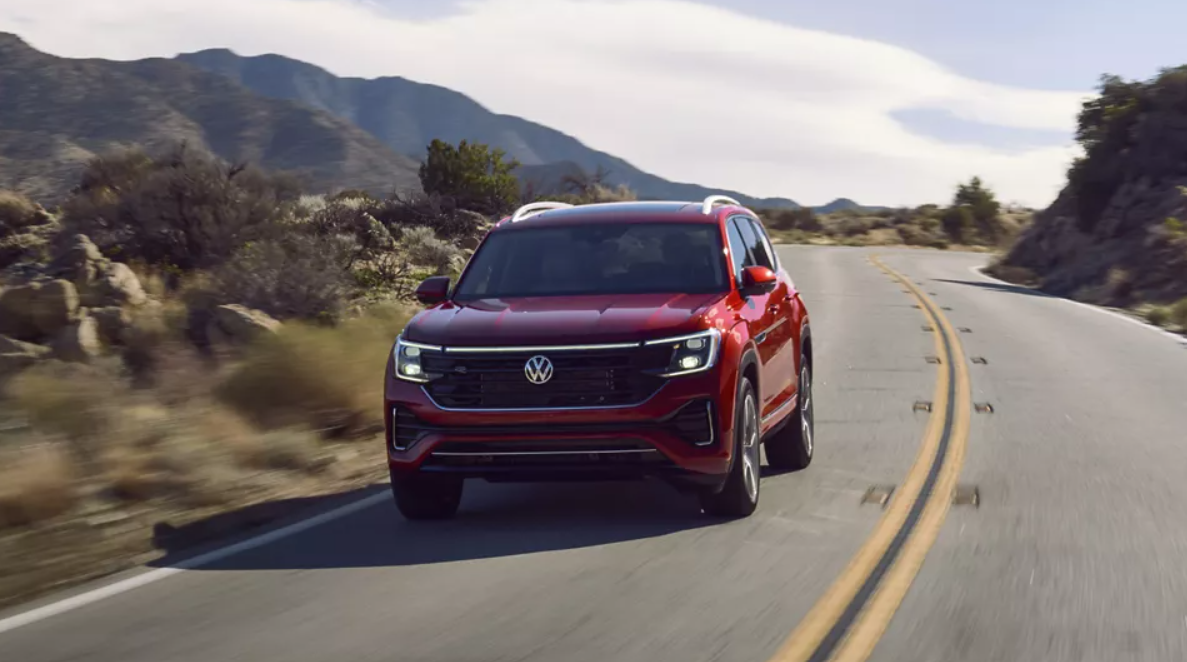  Volkswagen's red Atlas 2024 SUV on the road 