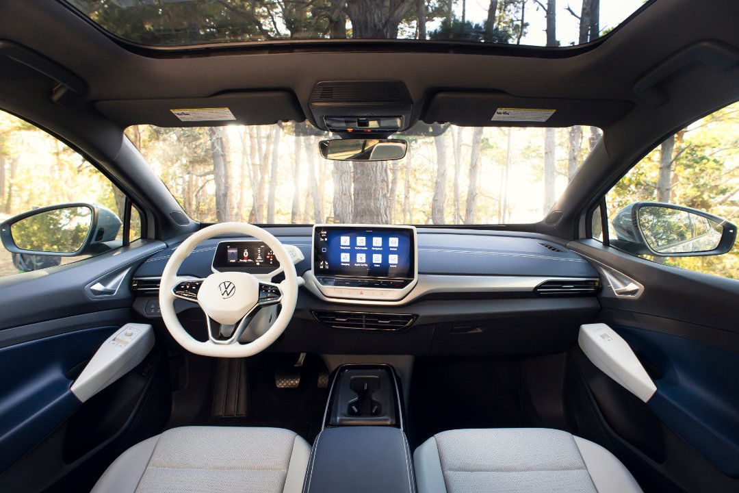 Interior view of the Volkswagen ID4 2023 with forest view