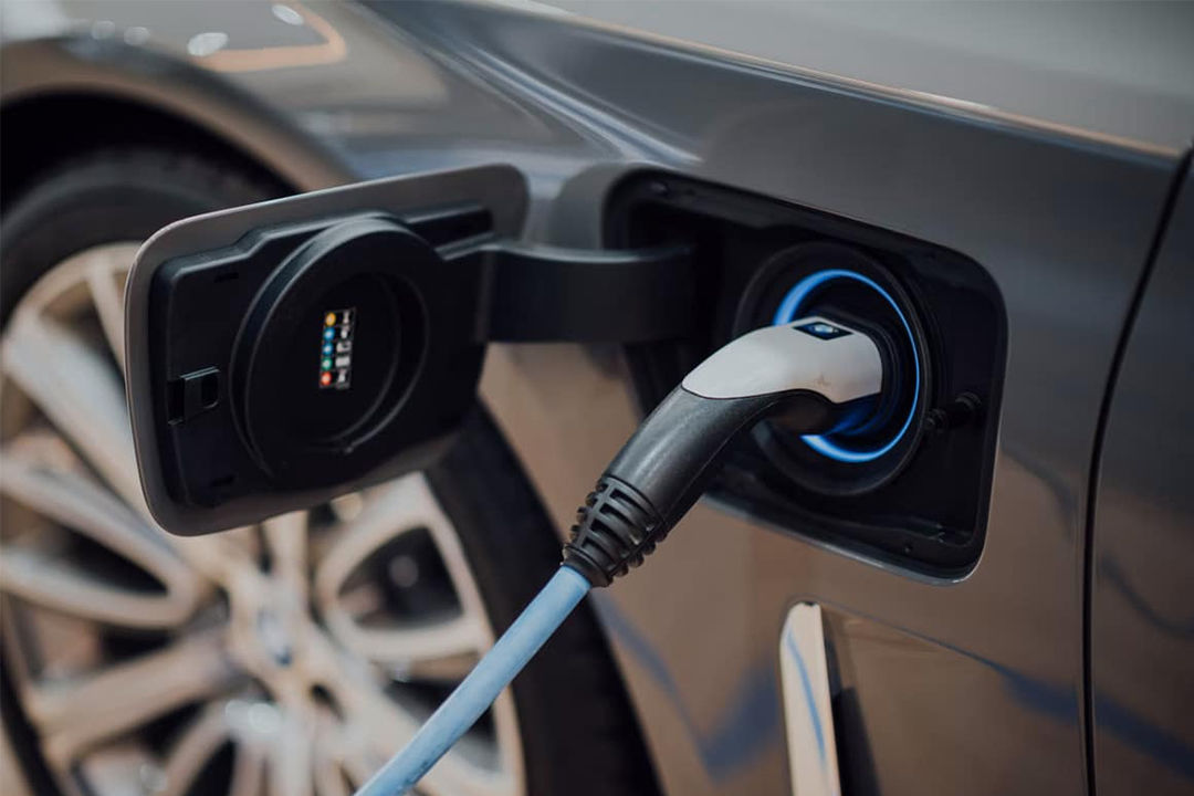 Close-up view of a Volkswagen vehicle charging