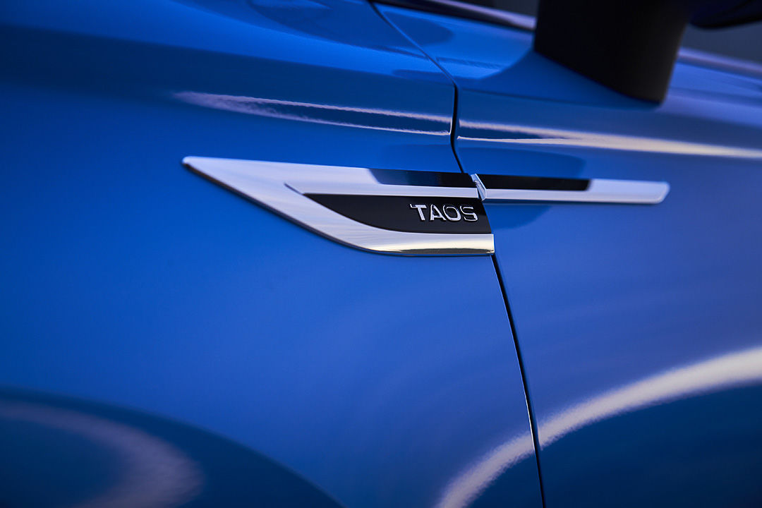 close up view of the 2022 Volkswagen Taos model badge