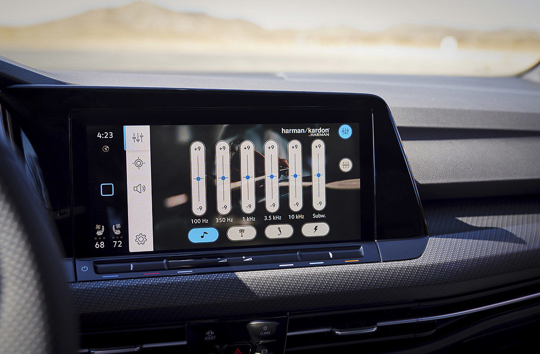 view of the touchscreen and Harman Kardon EQ control inside of the 2022 Volkswagen Golf R