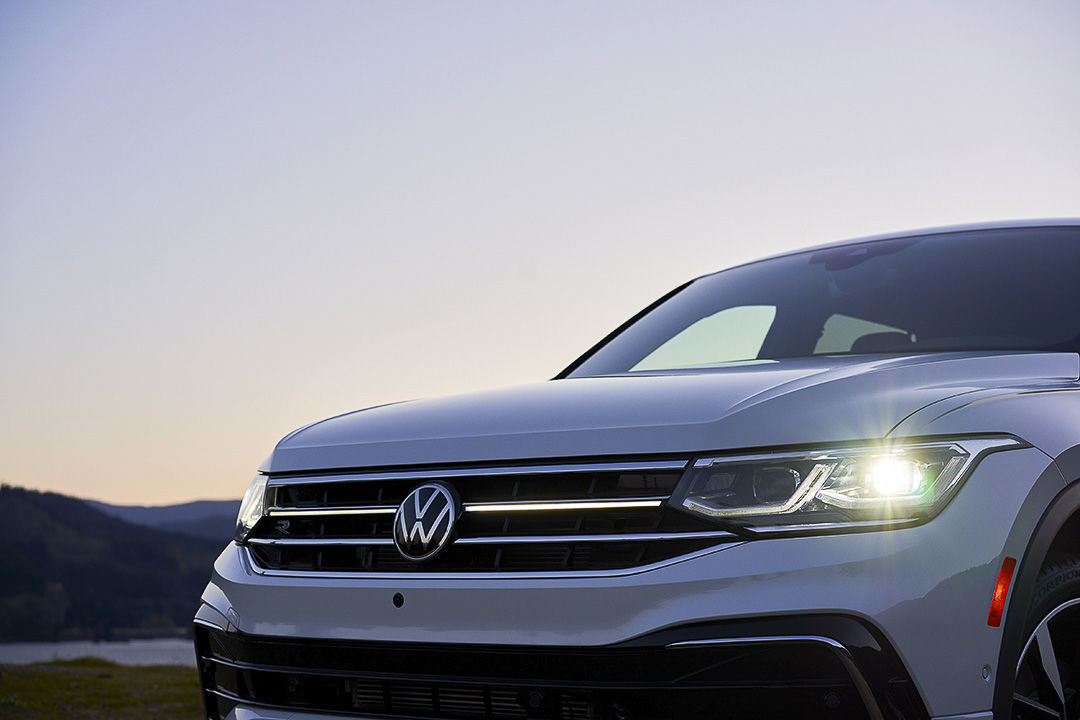 close up view of the headlights and grille of the 2022 Volkswagen Tiguan