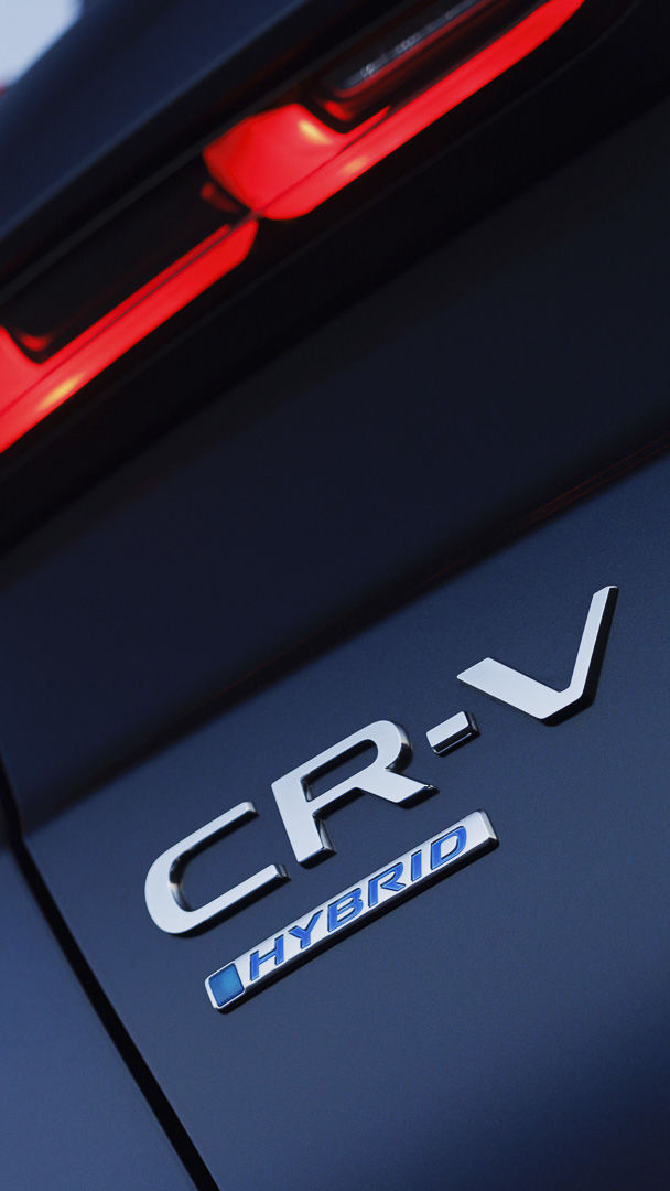 close up view of the badge on the 2023 Honda CR-V hybrid