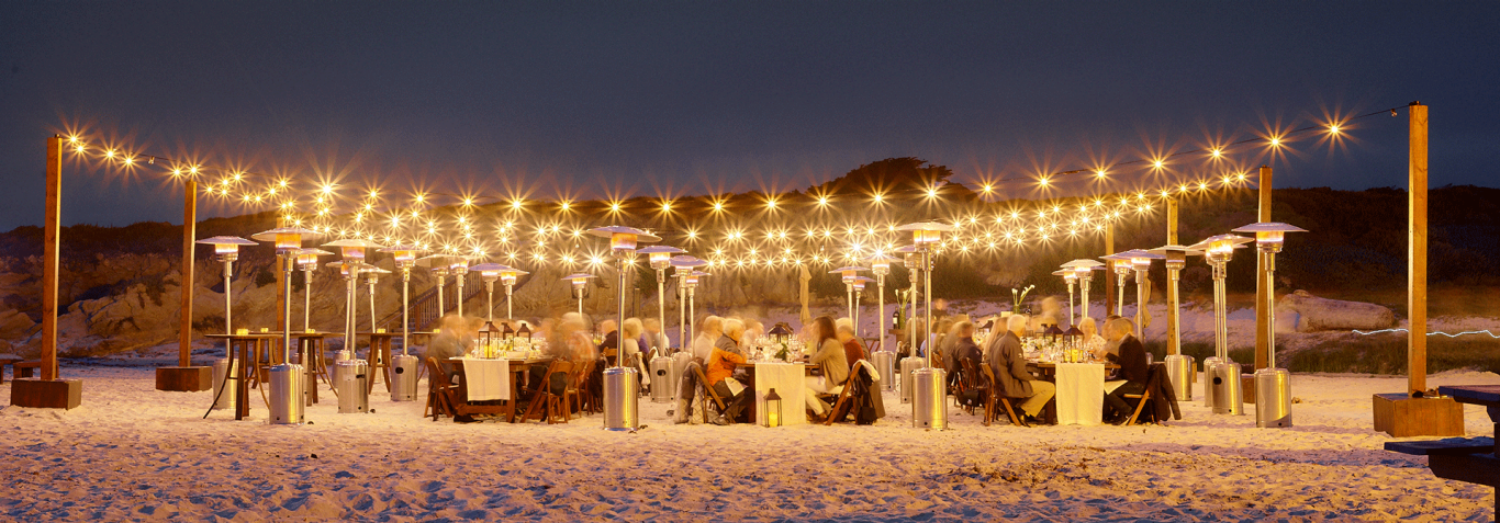 outdoor beach party at night with lights