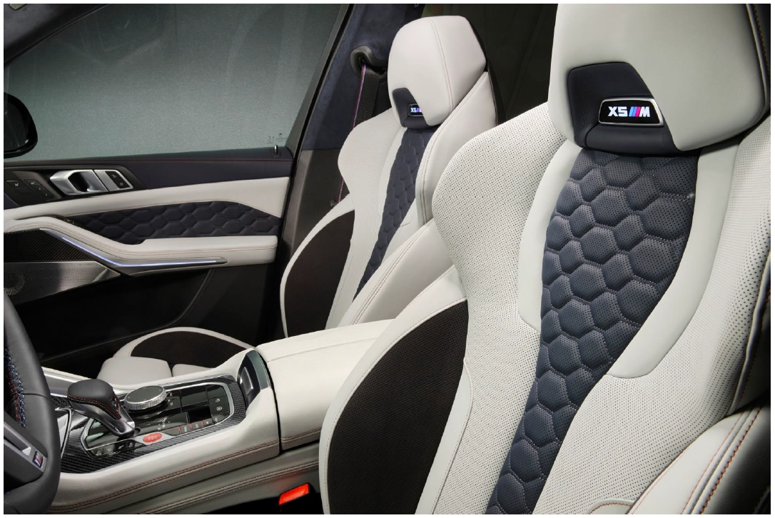 The BMW Individual full Merino leather upholstery in exclusive Silverstone/Night Blue bi-color finish blends