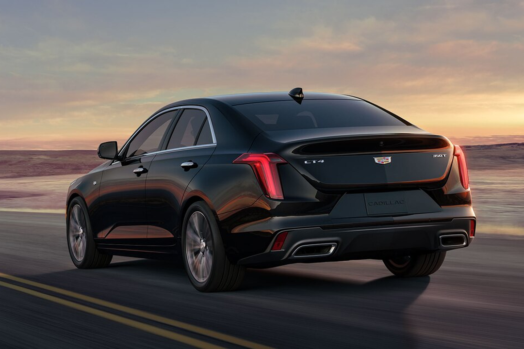 Rear view of the Cadillac CT4 2024 on the road at full power