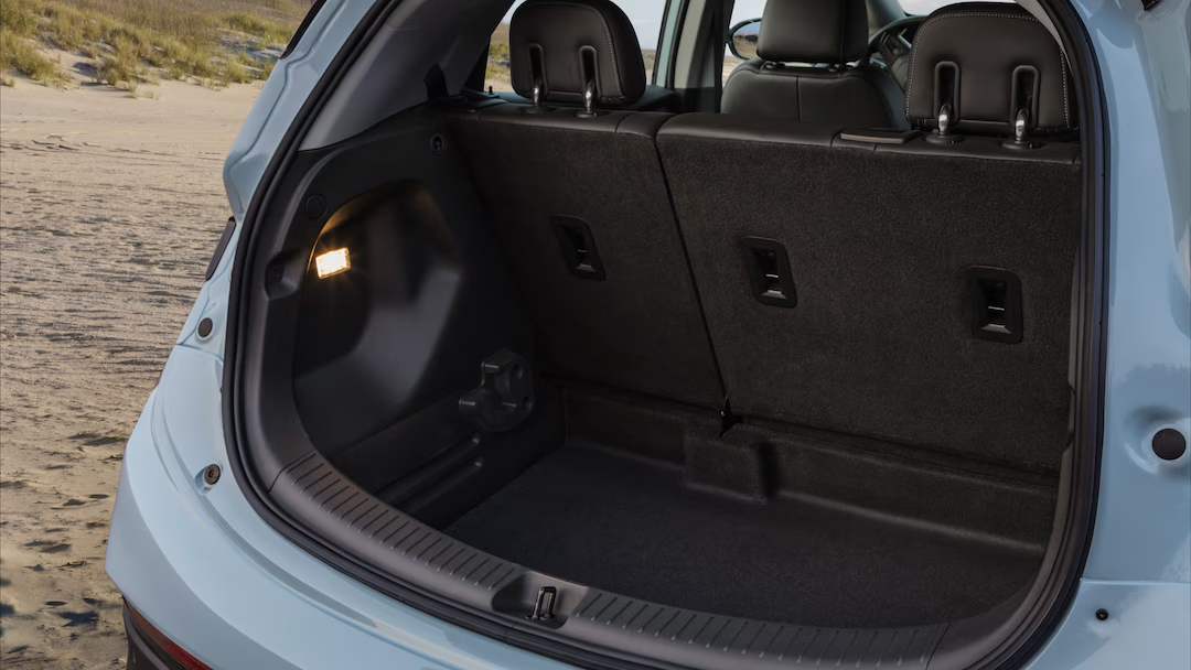 Chevrolet Bolt EV trunk. Cargo space. Trunk capacity. Trunk dimensions. Spacious trunk. Trunk versatility. Trunk access. Power liftgate. Convenient storage. Loading system. Easy loading. Rear trunk. Trunk utilization. Trunk organization. Loading safety. Loading equipment. Luggage loading. Material transport. Trunk for travel. Trunk amenities.