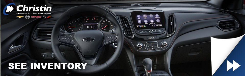 2021 chevrolet equinox LT SUV vehicle interior view with steering wheel and center console and christin automobiles logo