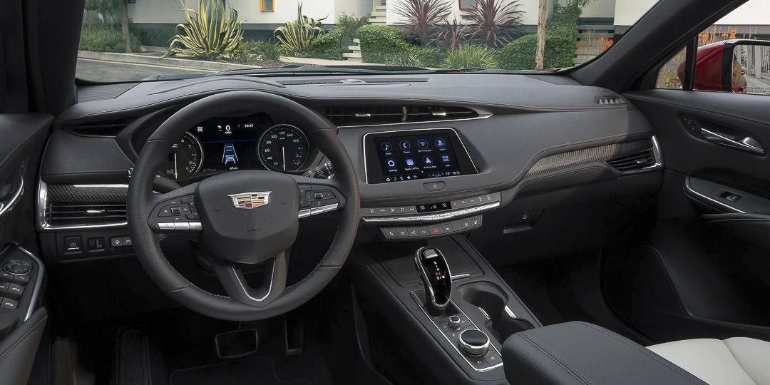 view of the steering wheel, central console and dashboard of the 2022 Cadillac XT4