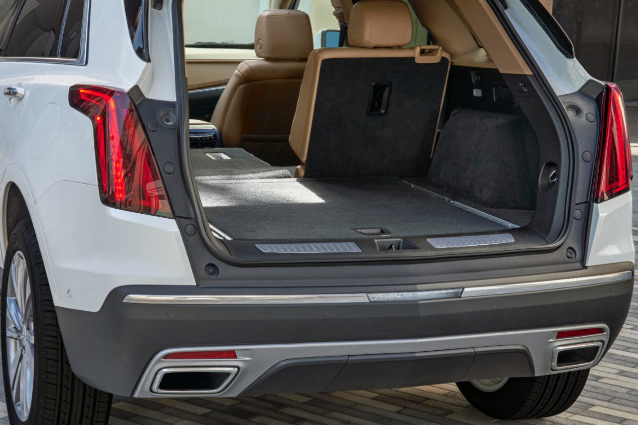 rear view of a 2023 Cadillac XT5 with the trunk open to see the cargo space