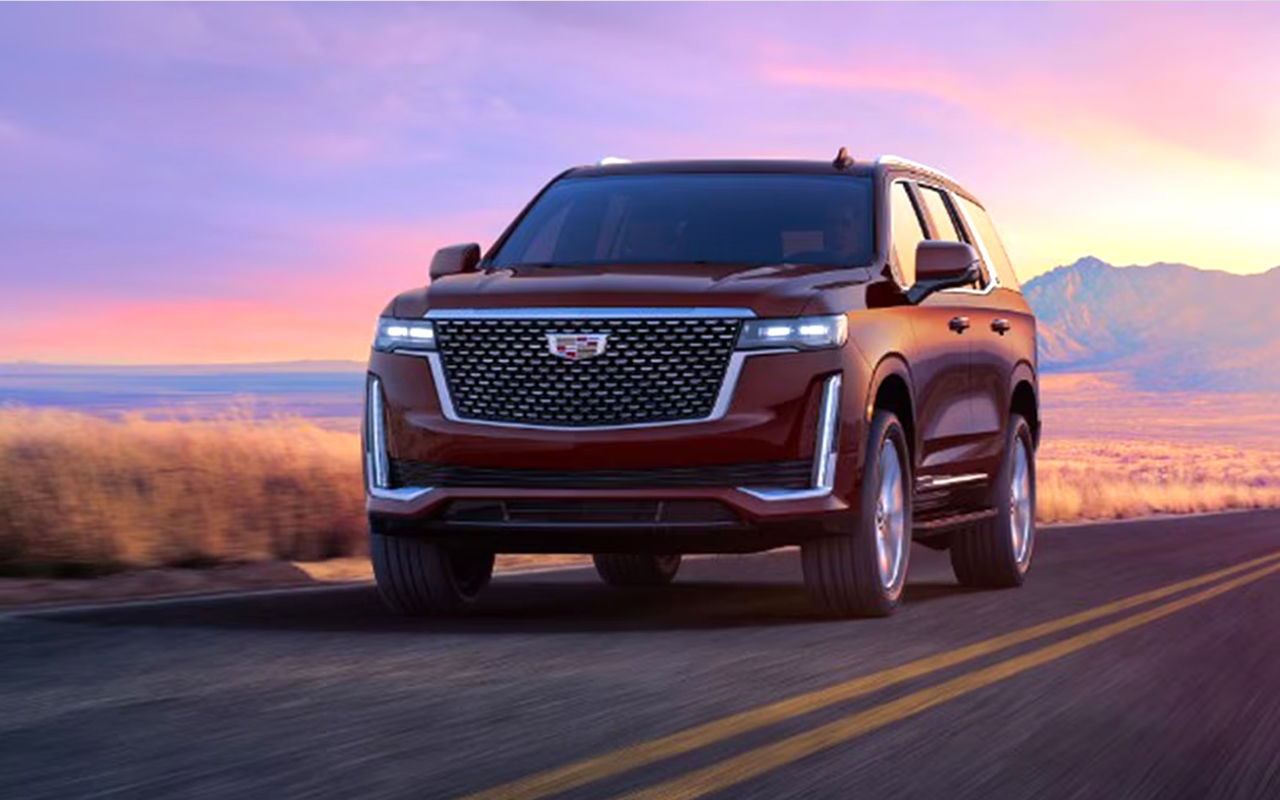 Front view of the Cadillac Escapade 2024 on the road at full power