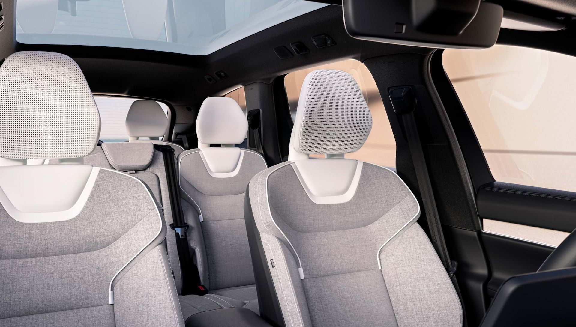 grey 2023 volvo ex90 mid-size suv interior seats view in simple geometric background in west of montreal