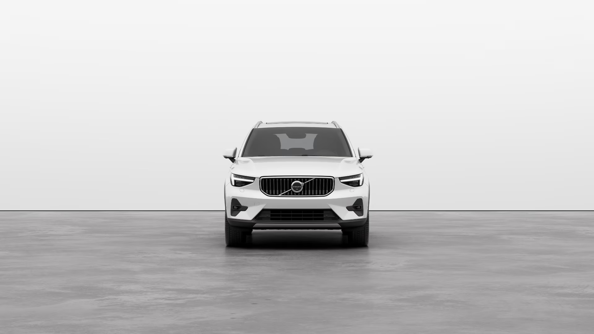 Volvo XC40 Recharge crystal white. Electric SUV. Elegant design. Powerful performance. Fast charging. Extended range. Spacious interior. Cutting-edge technology. Advanced safety system. Silent driving. Instant acceleration. Premium comfort. Modern connectivity. Innovative infotainment. Durable materials. Leather seats. Panoramic roof. LED lighting. Voice control. Intuitive interface. Smooth driving experience. Off-road capabilities. Scandinavian style. High-end finishes. Energy efficiency. Included charging station. Navigation system. Family-friendly. Environmentally friendly.