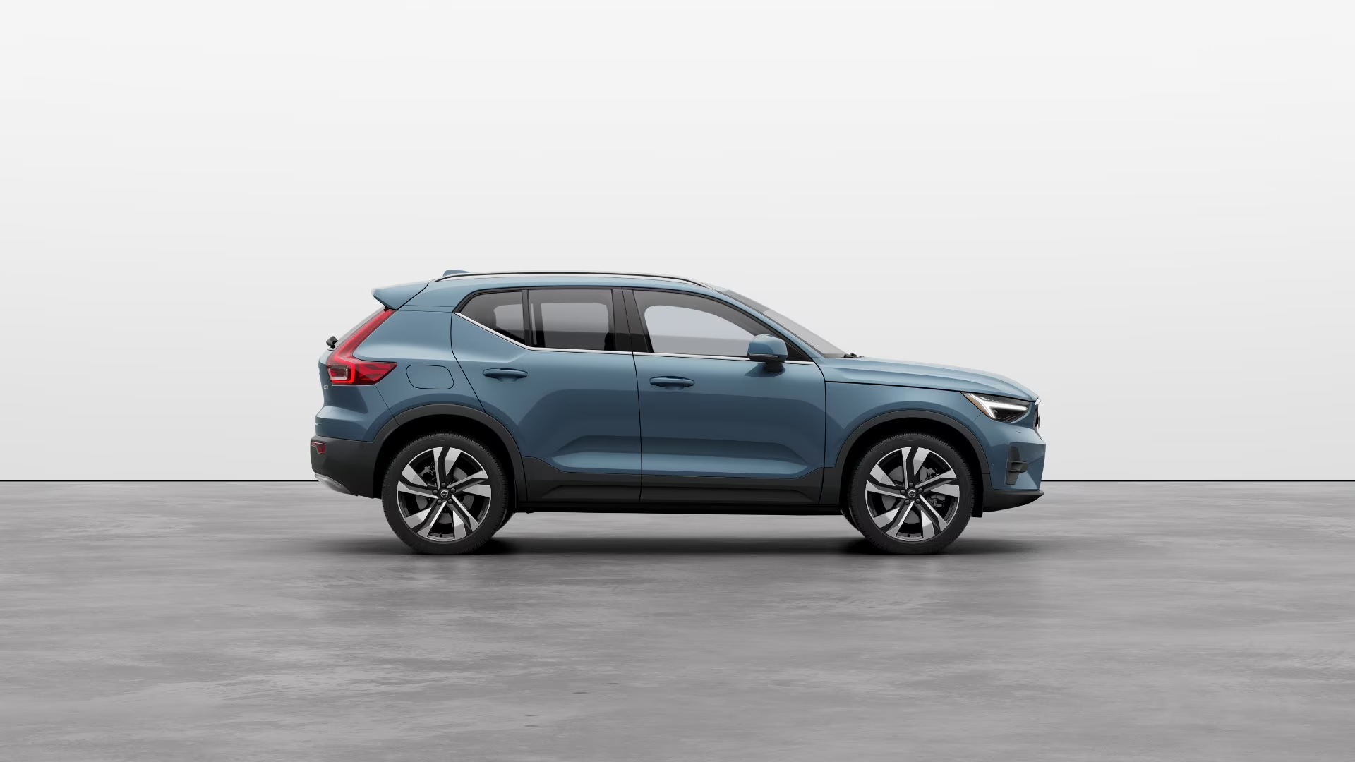 Volvo XC40 Recharge fjord blue. Electric SUV. Elegant design. Eco-friendly performance. Fast charging. Extended range. Spacious interior. Cutting-edge technology. Advanced safety system. Silent driving. Instant acceleration. Premium comfort. Modern connectivity. Innovative infotainment. Durable materials. Leather seats. Panoramic roof. LED lighting. Voice control. Intuitive interface. Smooth driving experience. Off-road capabilities. Scandinavian style. High-end finishes. Energy efficiency. Included charging station. Navigation system. Family-friendly. Environmentally friendly.