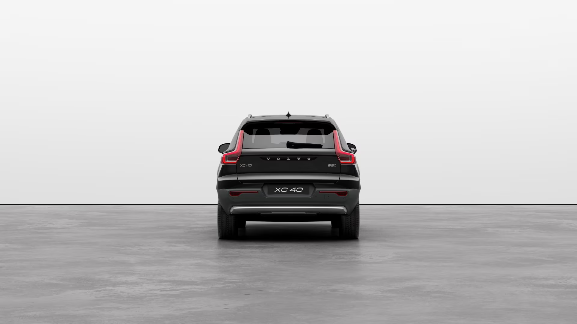 Volvo XC40 Recharge onyx black. Electric SUV. Elegant design. Powerful performance. Fast charging. Extended range. Refined interior. Advanced technology. Safety system. Silent driving. Instant acceleration. Luxurious comfort. Modern connectivity. Innovative infotainment system. Premium materials. Leather seats. Panoramic roof. LED lighting. Voice control. Intuitive interface. Smooth driving experience. Off-road capabilities. Scandinavian style. Premium finishes. Energy efficiency. Included charging station. Navigation system. Family-friendly. Environmentally friendly.