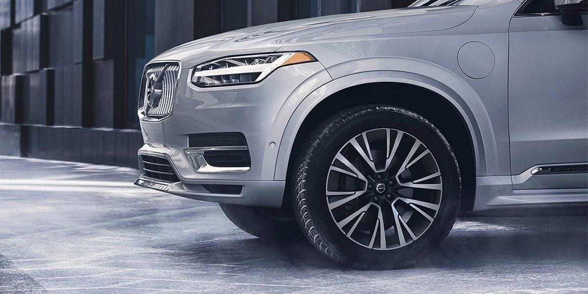 Volvo close-up, winter tires, Volvo wheel in snow, luxury car wheel, snow traction.