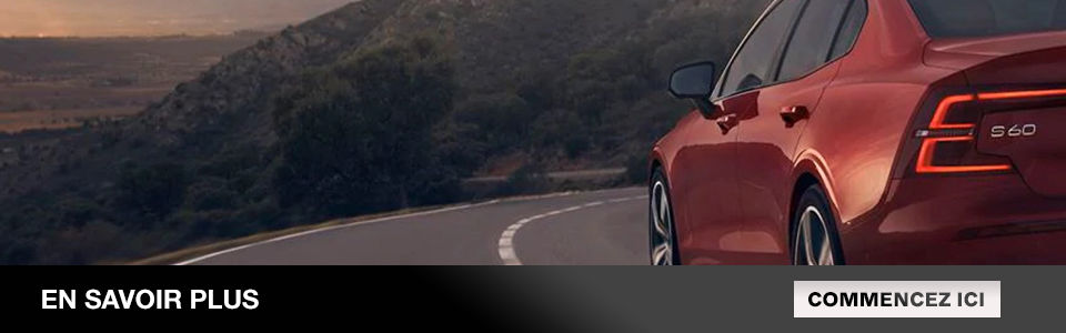 En savoir plus: Image d'un volvo s60 rouge qui descend sur une route près d'une montagne