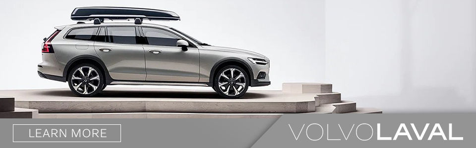 gray 2021 Volvo V60 Cross Country vehicle with volvo laval dealership logo
