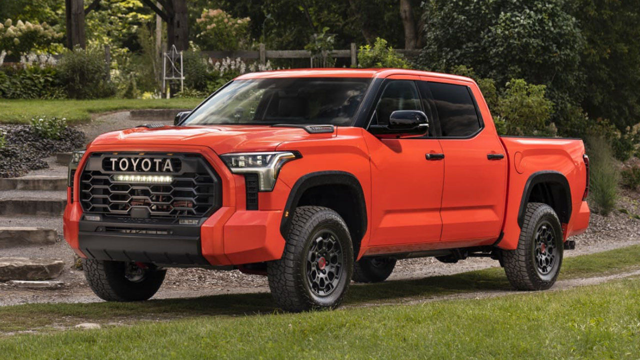 front side view of a 2022 Toyota Tundra in front of a garden