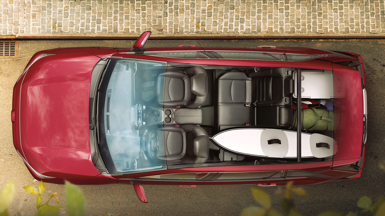 Aerial view of Toyota RAV4 2024 with camping equipment