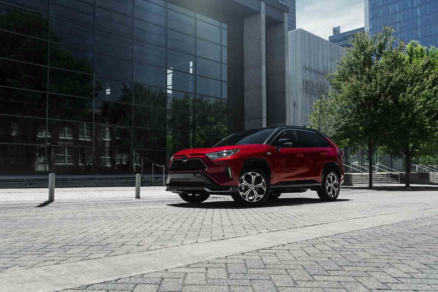 three quarter front view of the 2021 Toyota RAV4 parked on a street