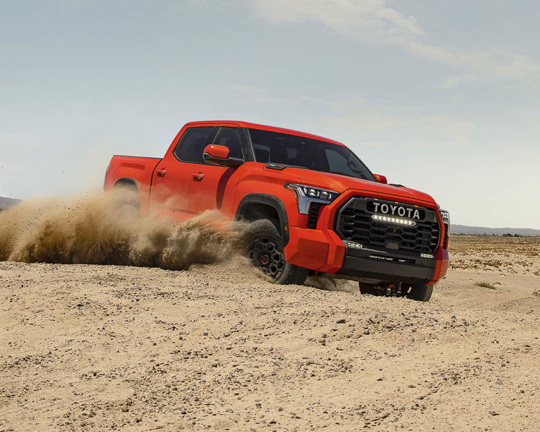 three quarter front view of the 2022 Toyota Tundra TRD in a controlled drift