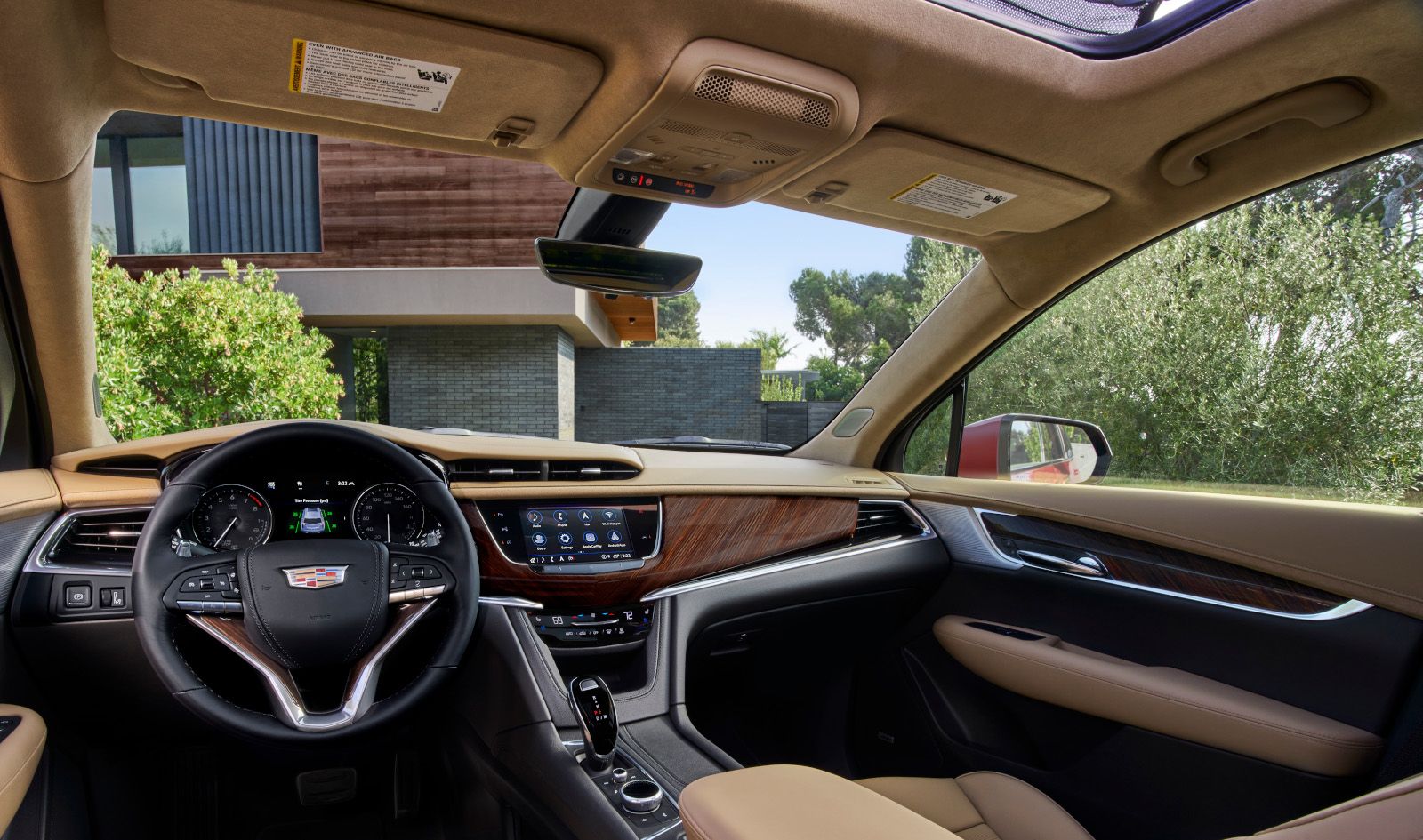 2025 Cadillac XT6 Interior view of the 2025 Cadillac XT6's dashboard, infotainment screen, and steering wheel - Applewood Cadillac - Cadillac car dealership in Mississauga, Ontario
