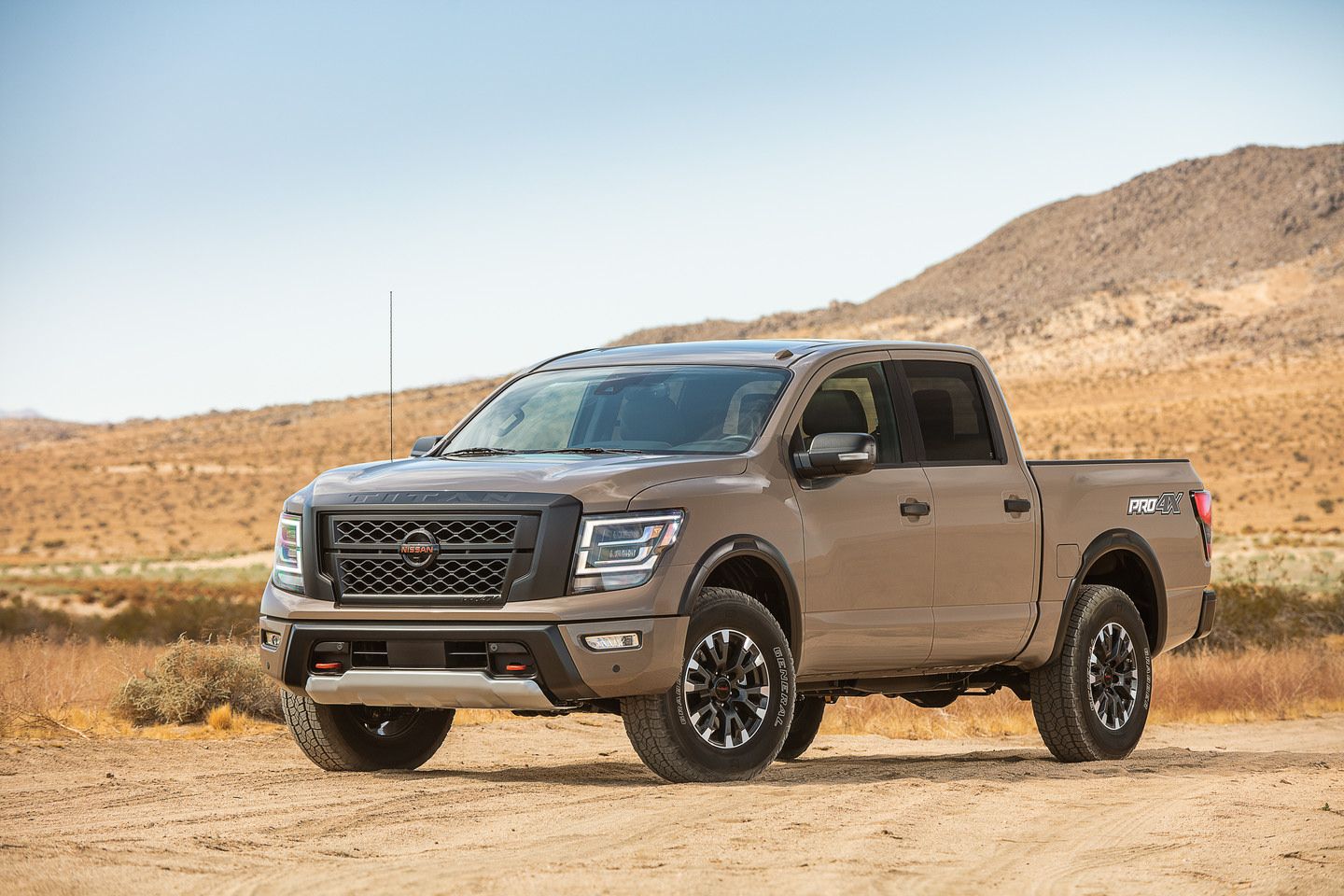 2020 Nissan Titan - a brown Nissan Titan parked off-road - AutoPark Brampton - A pre-owned car dealership in Brampton Ontario