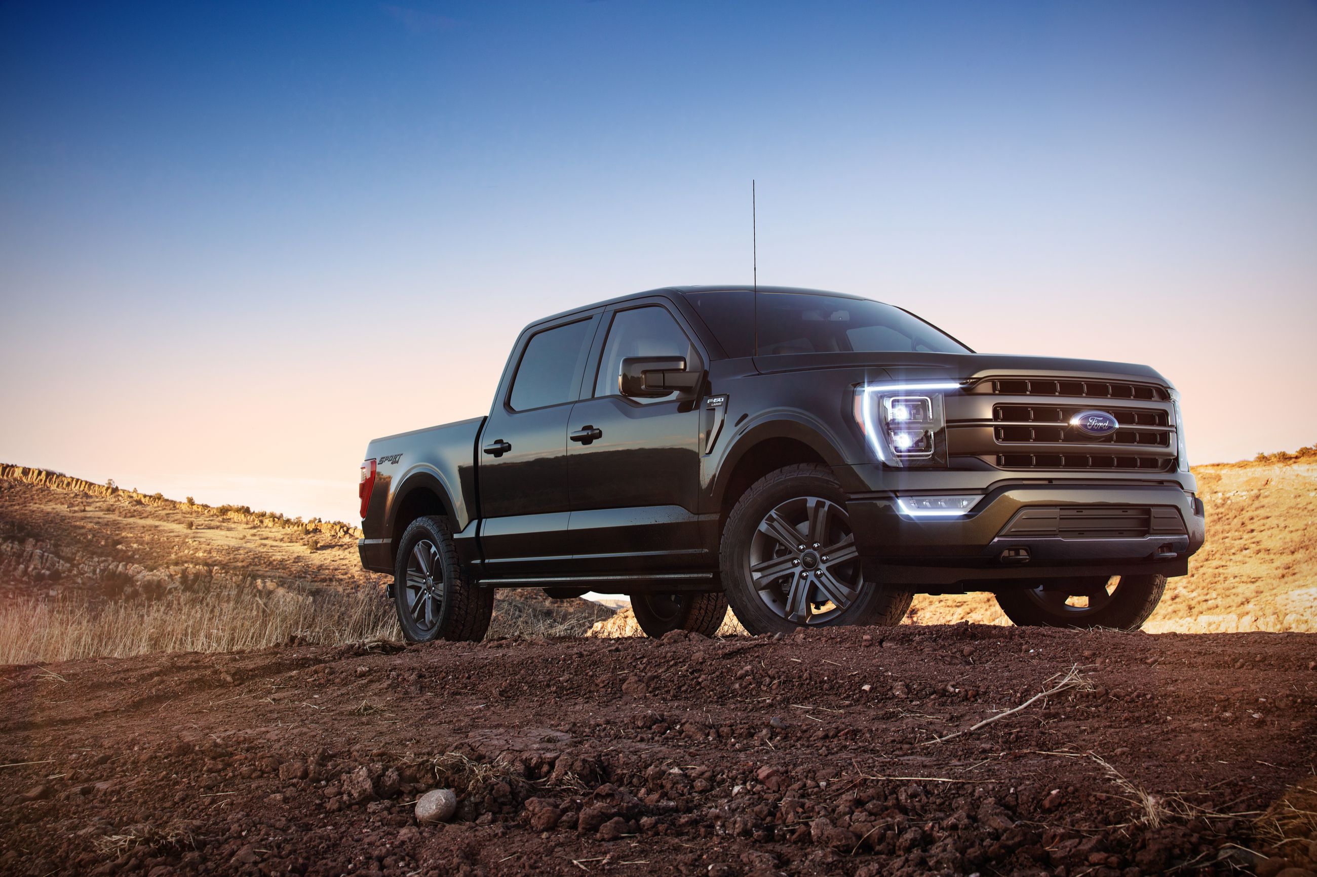 2018 Ford F-150 - a black Ford F-150 parked on a dirt patch - AutoPark Brampton - A pre-owned car dealership in Brampton Ontario