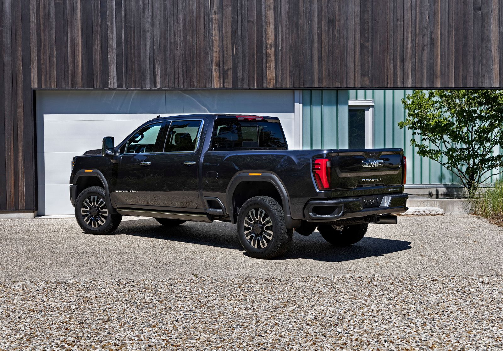 2025 GMC Sierra 2500 HD - rear view of a black 2025 GMC Sierra 2500 HD parked in a driveway - City GM - GMC car dealership in Toronto, Ontario