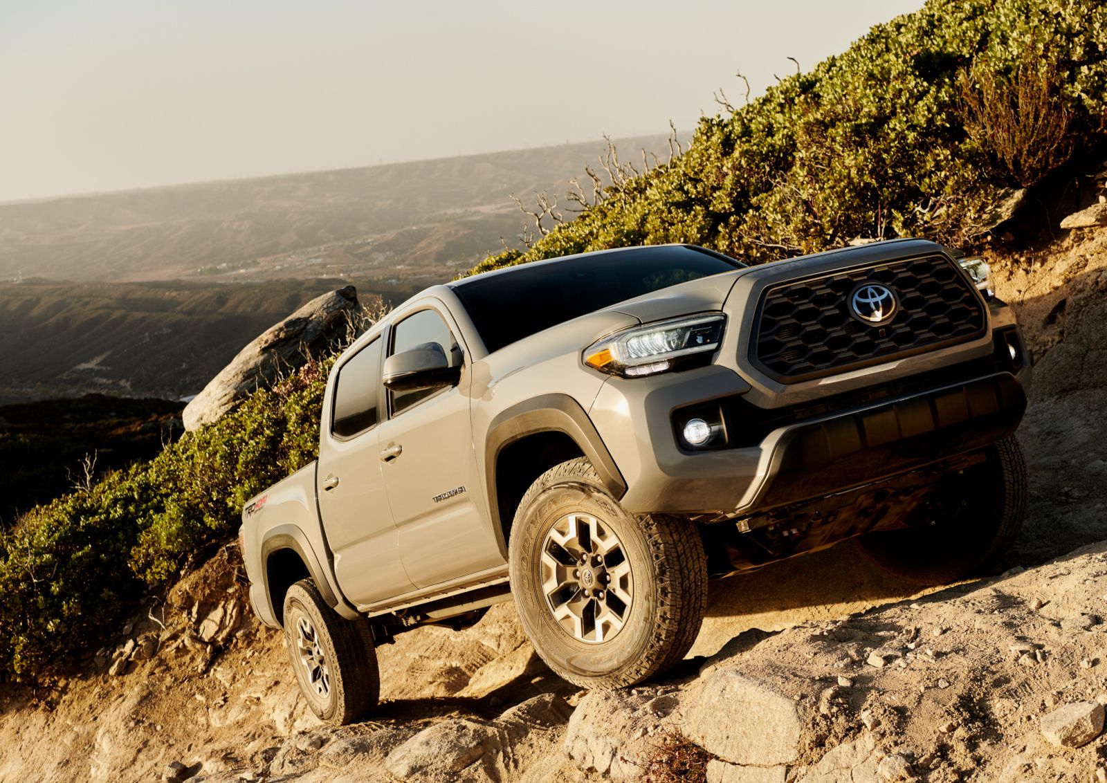 2020 Toyota Tacoma - a beige 2020 Toyota Tacoma off-road - AutoPark Barrie pre-owned car dealer in Innisfil, Ontario