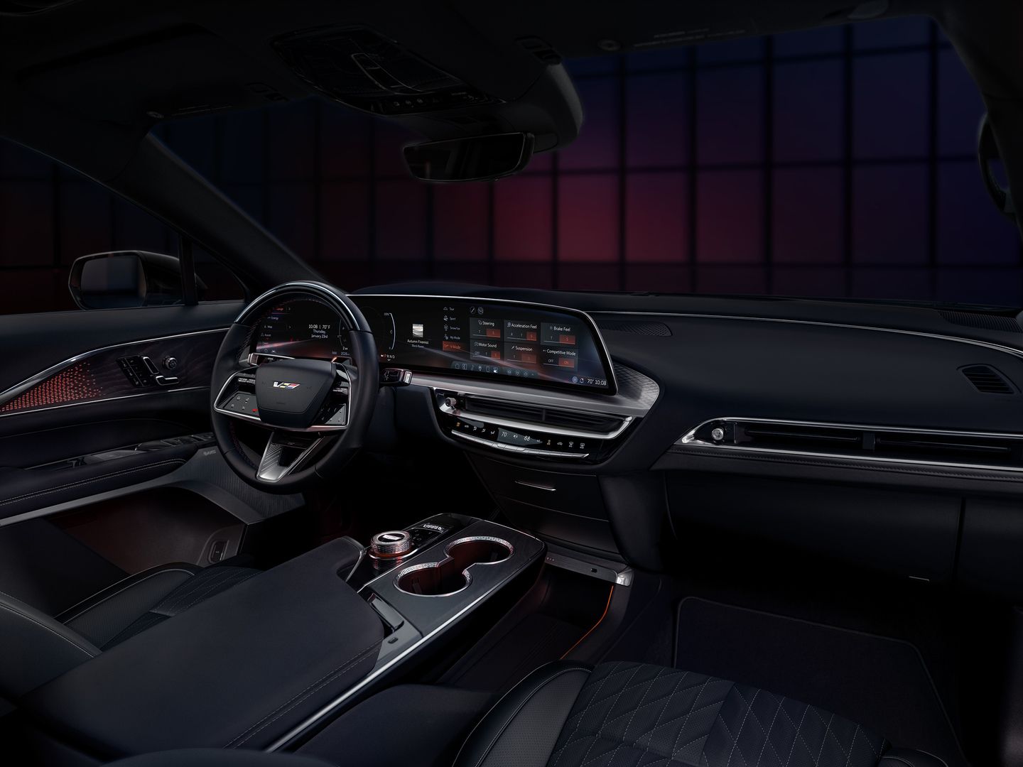 2026 Cadillac Lyriq-V - Interior view of the 2026 Cadillac Lyriq-V dashboard, steering wheel, and curved display screen - Applewood Cadillac - Cadillac car dealership in Mississauga, ON