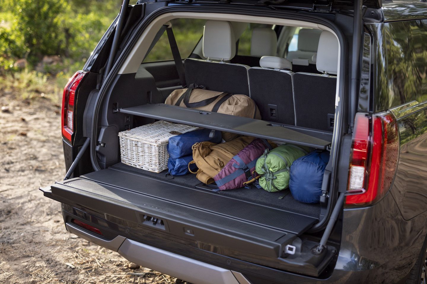 2025 Ford Expedition - view of the spacious rear cargo area of the 2025 Ford Expedition packed with luggage and camping gear - Bayfield Ford - Ford car dealership in Barrie, ON