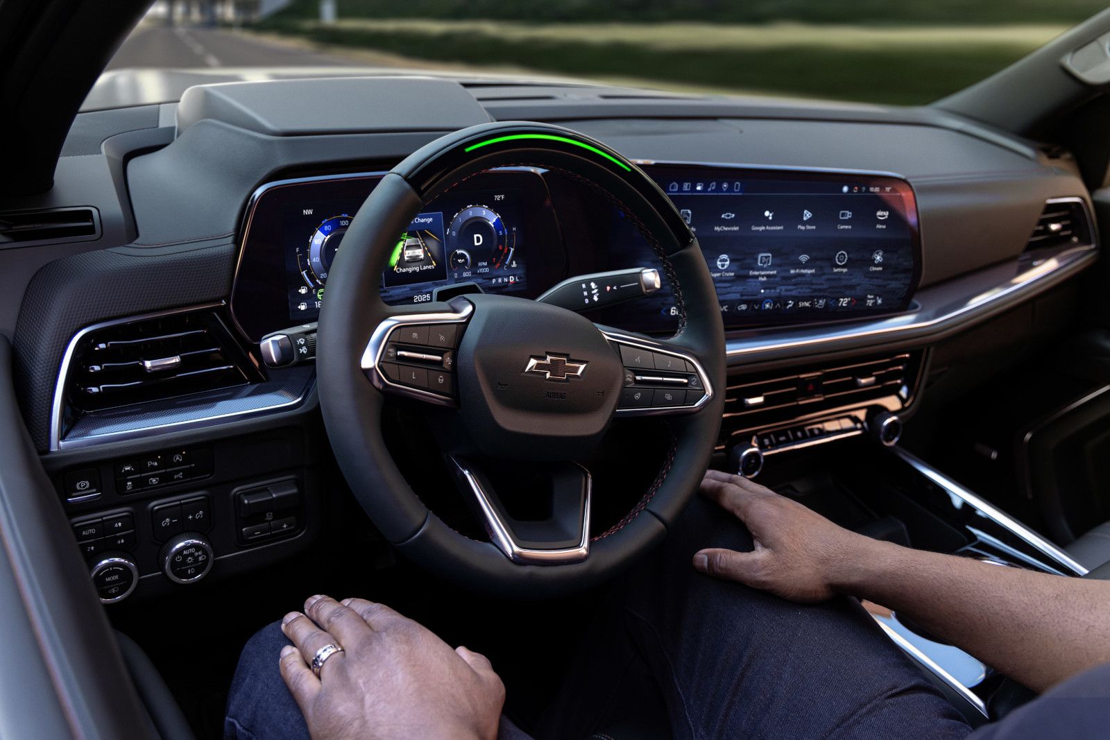 2025 Chevrolet Tahoe interior view of the 2025 Chevrolet Tahoe driver's seat, showing the steering wheel and large infotainment screen - City Chevrolet Buick GMC - new car dealerships in Ontario