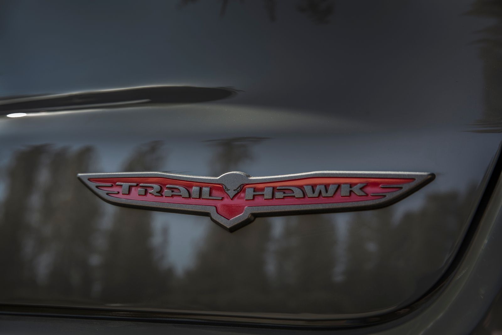 2025 Jeep Compass a close-up of the Trailhawk badge on a 2025 Jeep Compass - Cooksville Dodge - new car dealerships in Ontario