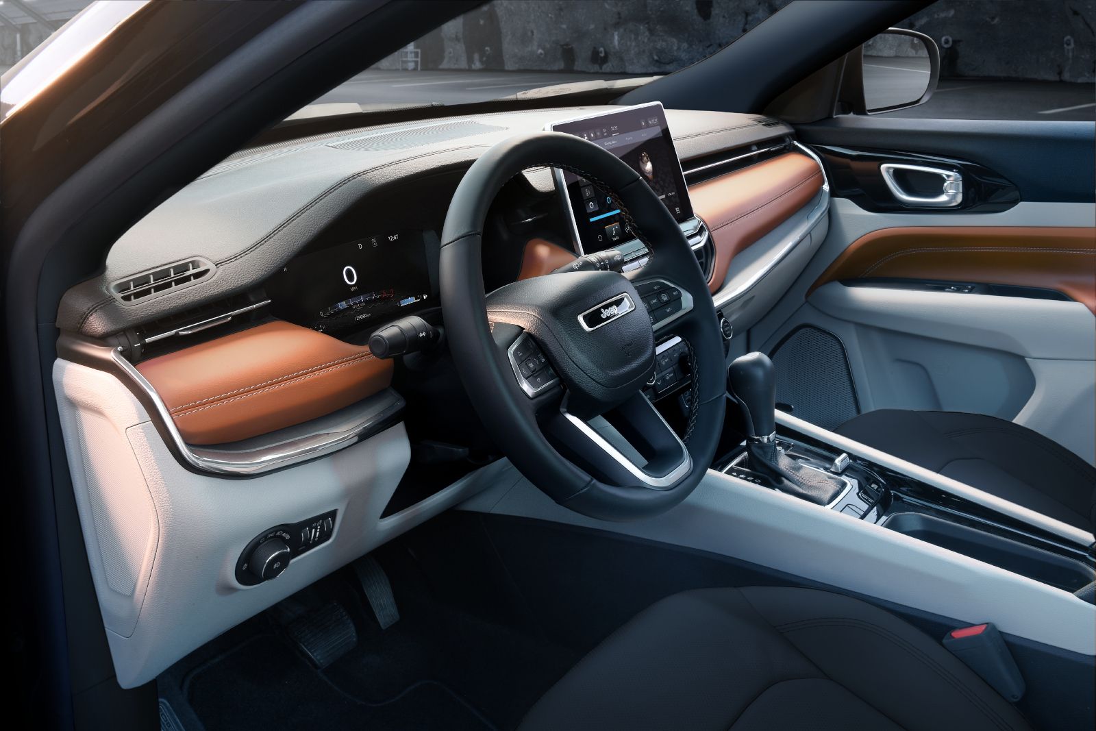 2025 Jeep Compass an interior view of the 2025 Jeep Compass cockpit, showing the steering wheel and dashboard - Cooksville Dodge - new car dealership in Ontario