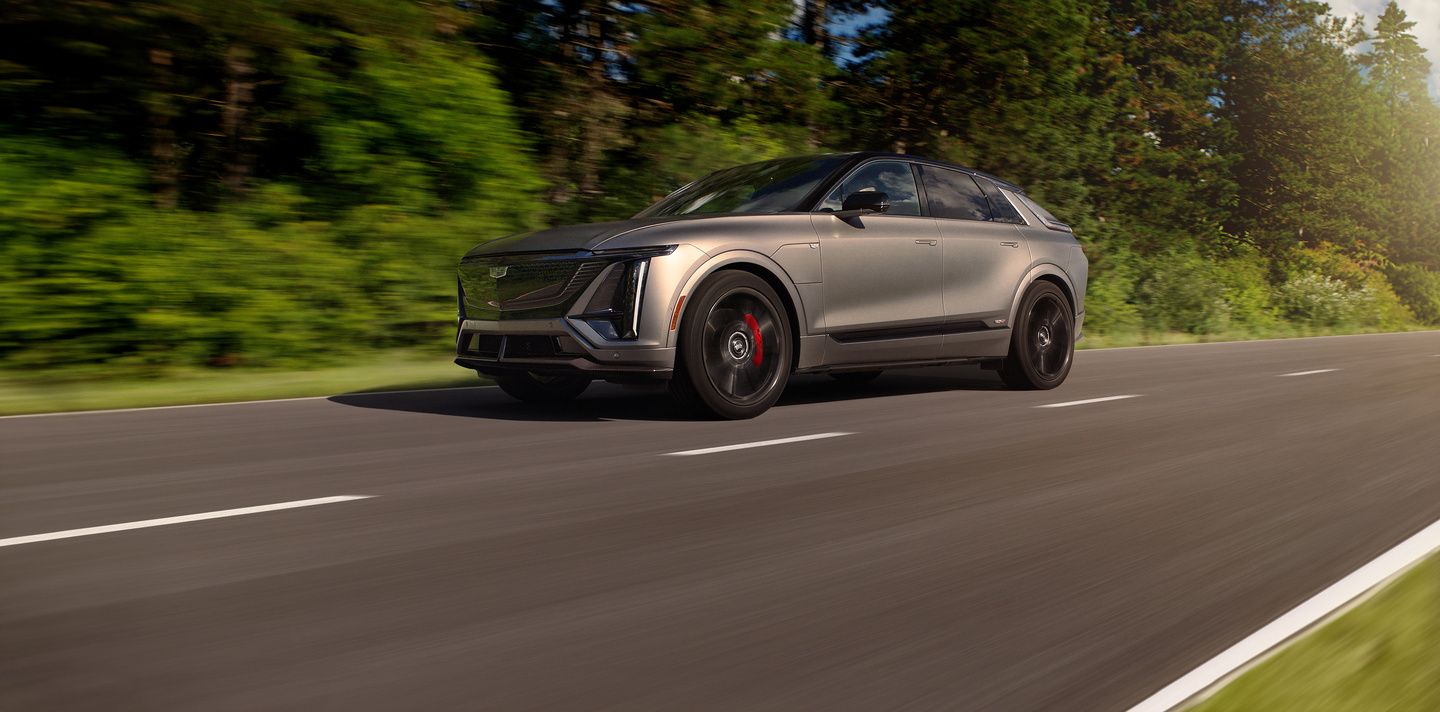 2026 Cadillac Lyriq-V - A silver Cadillac Lyriq-V driving on a paved road - City Cadillac - New car dealership in Toronto, Ontario
