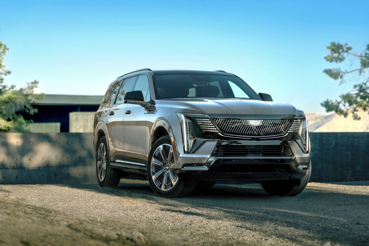 2026 Cadillac Escalade IQL - Front three-quarter view of a silver Cadillac Escalade IQL parked outdoors - City Cadillac - Cadillac car dealership in Toronto, Ontario