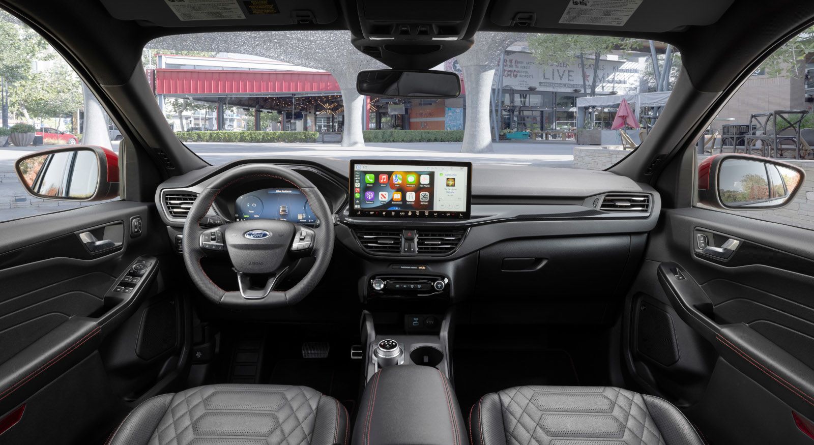 2026 Ford Escape - interior view from the driver's perspective showing the dashboard, steering wheel, and large infotainment screen - Bayfield Ford - Ford car dealership in Barrie, ON