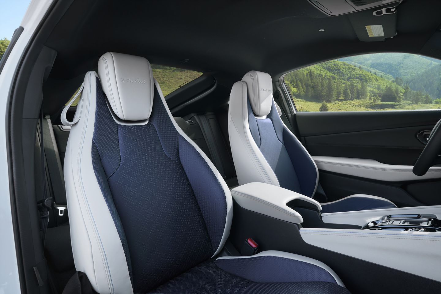 2026 Honda Prelude - Interior view of the two-tone white and blue front seats of the 2026 Honda Prelude - Goderich Honda - New car dealership in Goderich, Ontario