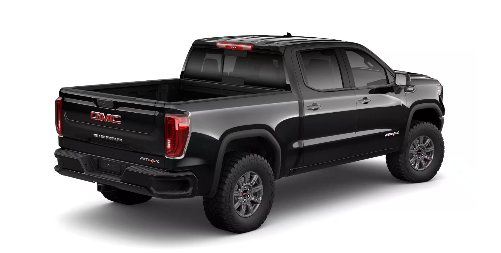 2026 GMC Sierra 1500 AT4X - A black 2026 GMC Sierra 1500 AT4X, viewed from the rear three-quarter angle to highlight its off-road design - City Chevrolet Buick GMC - New car dealership in Toronto, Ontario